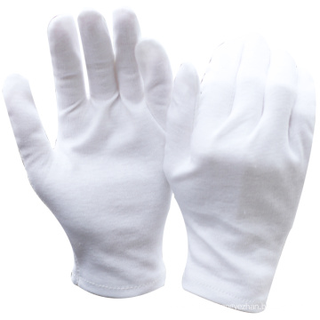 Reloj NMSAFETY que muestra el uso de 100% algodón para guantes de trabajo en tiendas